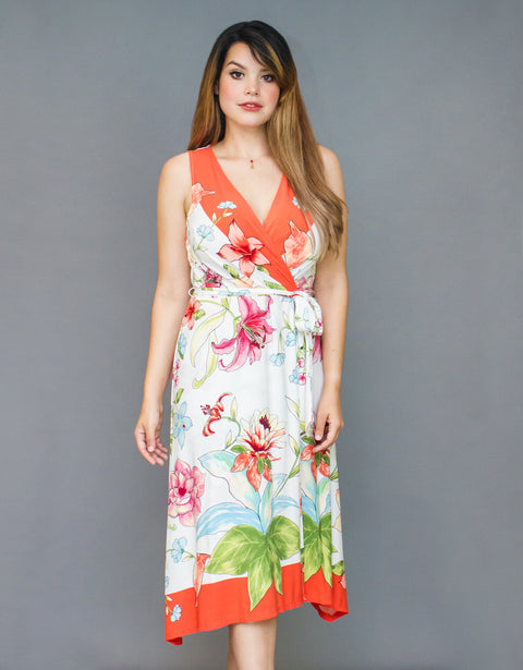 Vestido semi casual asimétrico estampado floral tropical lazo ajustable en la cintura sin mangas
